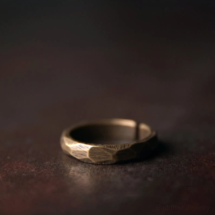 Single copper wealth ring flat lay view showing brushed antique bronze minimalist design