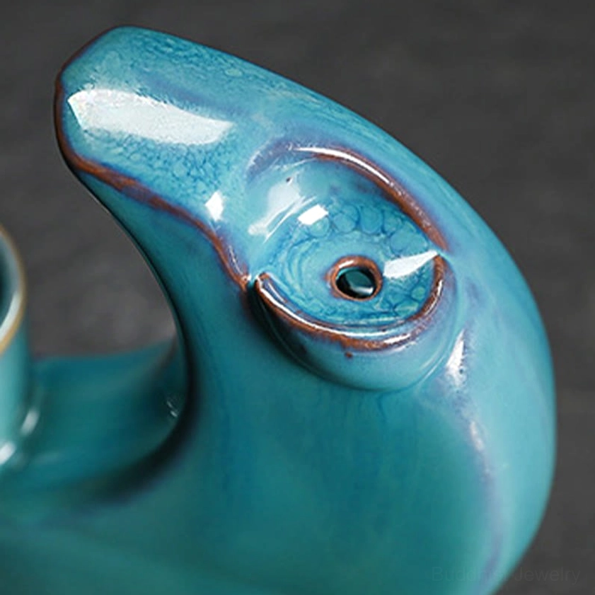Handcrafted ceramic crescent moon incense burner detail shot, showing glaze quality and craftsmanship
