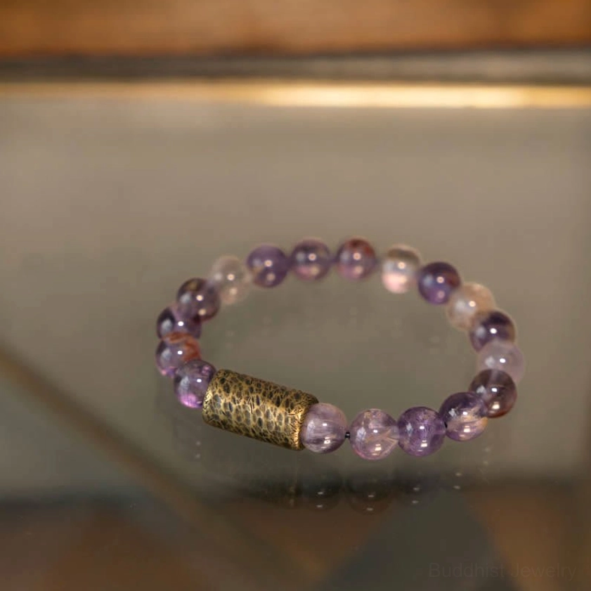 Meditation practice with crystal bracelet on wrist supporting spiritual mindfulness