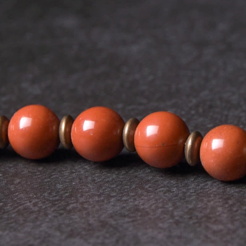 Natural stone crystal bracelet material quality - close-up showing polished 6mm beads and premium elastic