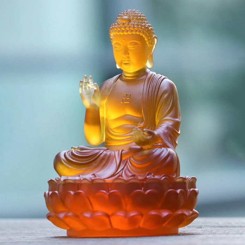 Buddha Liuli crystal art piece right side three-quarter angle showcasing detailed robe folds and hand positions