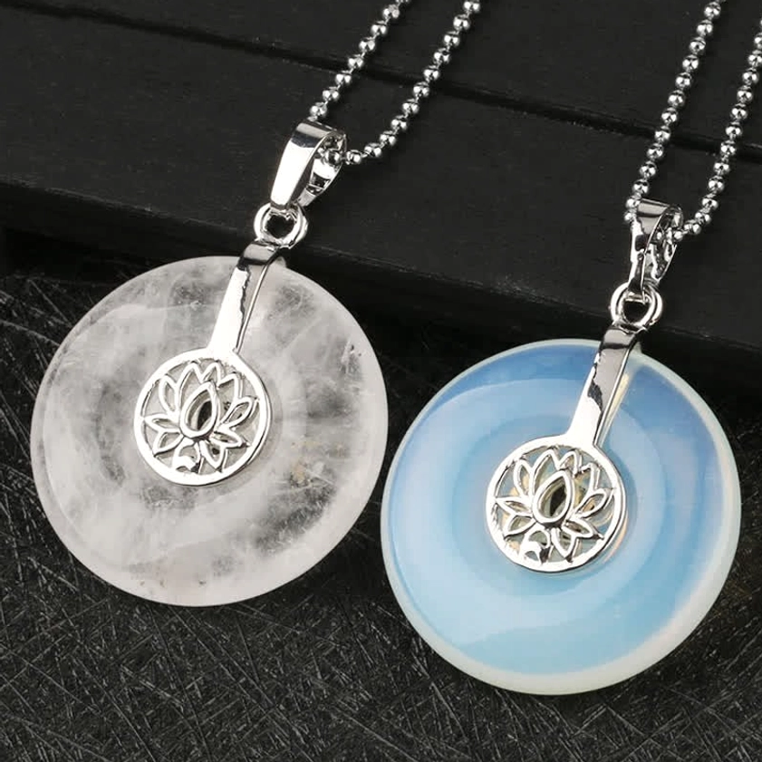 Crystal lotus donut pendant necklace with clear quartz and blue agate - silver metal charm