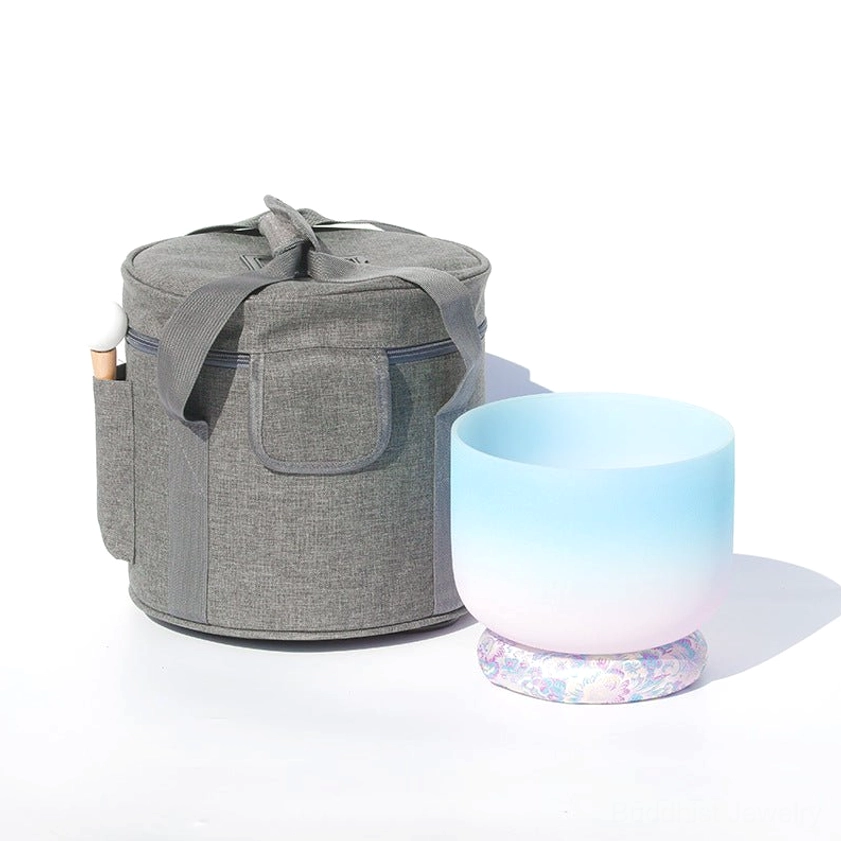 Complete crystal singing bowl meditation set in grey woven carry bag including bowl, mallet, cushion, and protective accessories for easy transport