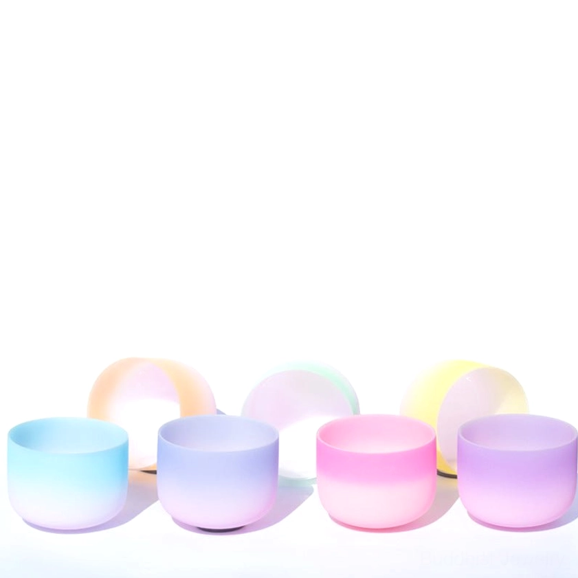 Collection of crystal singing bowls multiple pastel colors top-down view with cross-section samples