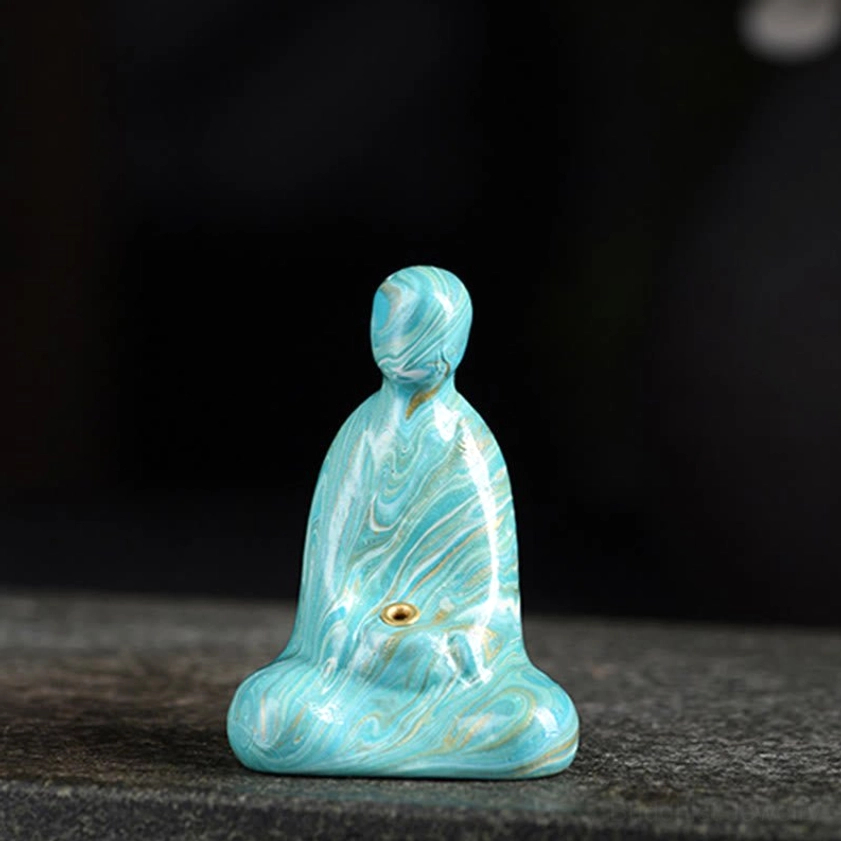 Cyan colored Buddha incense holder featuring traditional marbled lacquer art technique