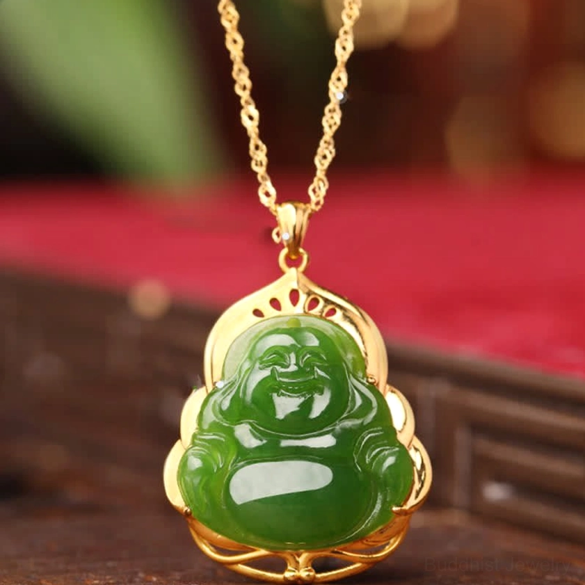 Cyan jade laughing Buddha pendant necklace with 925 sterling silver and 18K gold filigree setting, front view on red velvet