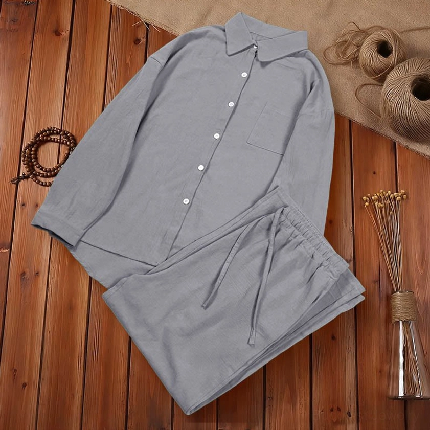 Dark gray meditation clothing set front display on neutral background