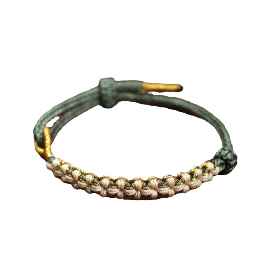 Dark green adjustable Buddhist bracelet with beige peach blossom knot pattern and metal adjusters close-up detail