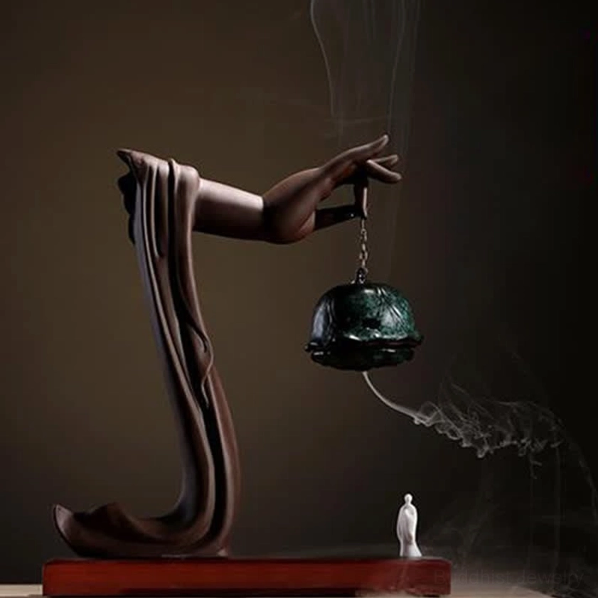 Handcrafted dark green Buddhist lotus incense burner with meditation statue