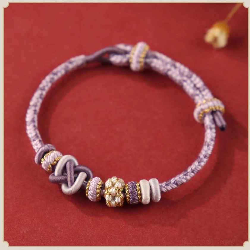 Dark purple Buddhist string bracelet with woven knots - handcrafted for deep intuition spiritual transformation and protection