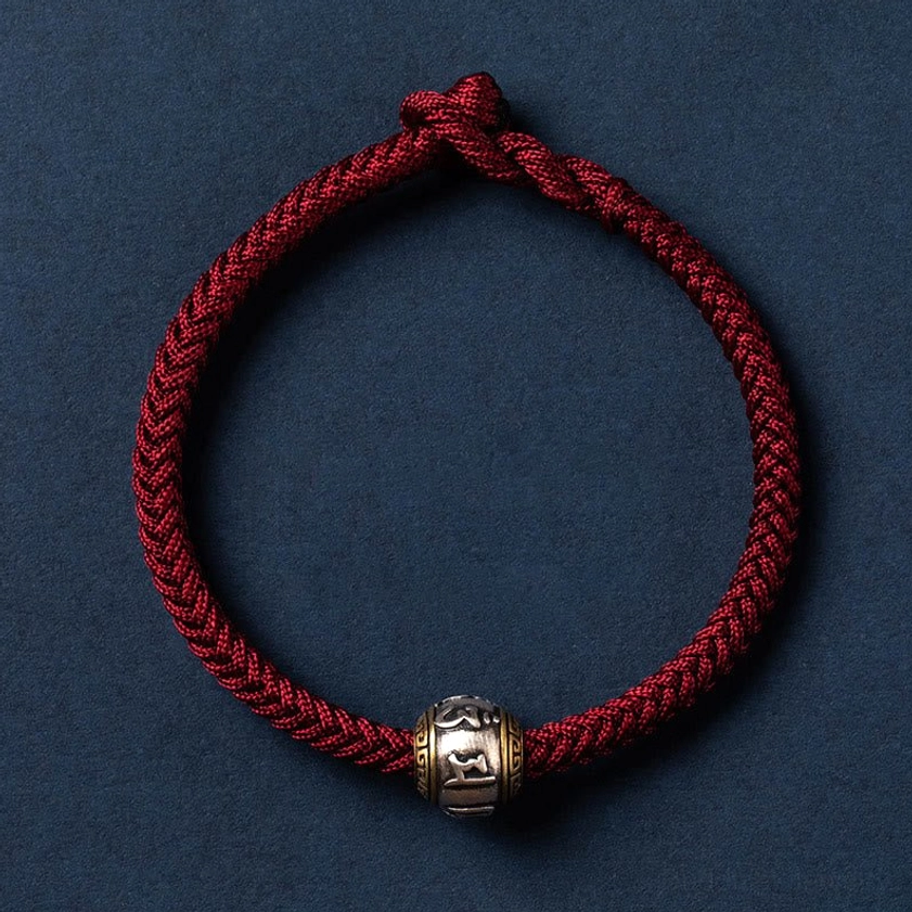 Dark red Buddhist braided bracelet with silver Om Mani Padme Hum pendant and colorful woven rope threads