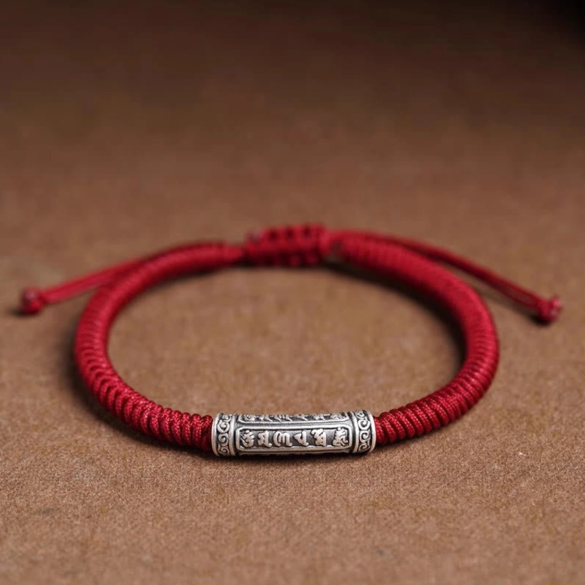 Dark red Om Mani Padme Hum rope bracelet with sterling silver engraved mantra charm