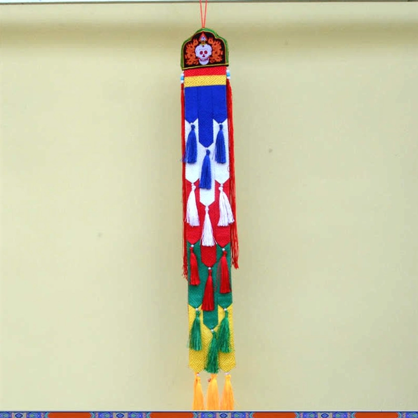Dharma skull Buddhist symbol tassel wall decoration with spiritual and philosophical meaning