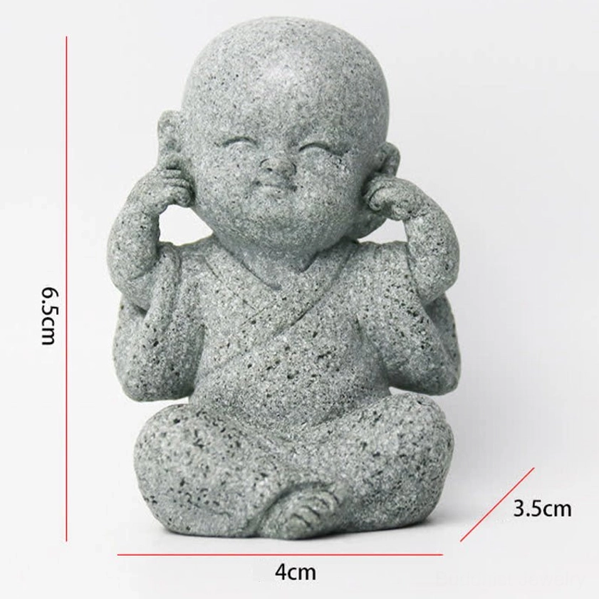 Don't read monk Buddha statue - wisdom and discernment symbol in natural sandstone finish