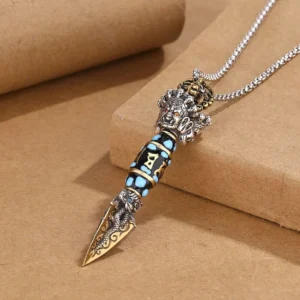 Om Mani Padme Hum Dorje Vajra Buddhist pendant necklace with rotatable dzi bead, silver-bronze mixed metal finish with turquoise inlays and dragon carvings, side view detail