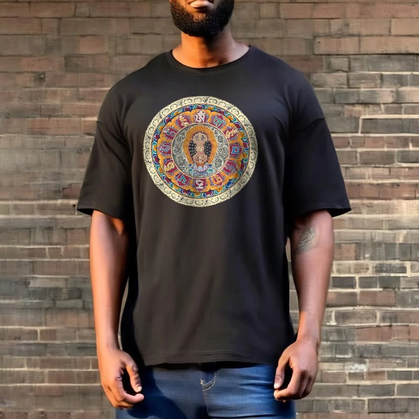 Male model in dark grey Dorje Vajra Mandala Buddhist cotton tee with centered mandala artwork, relaxed casual fit against brick wall