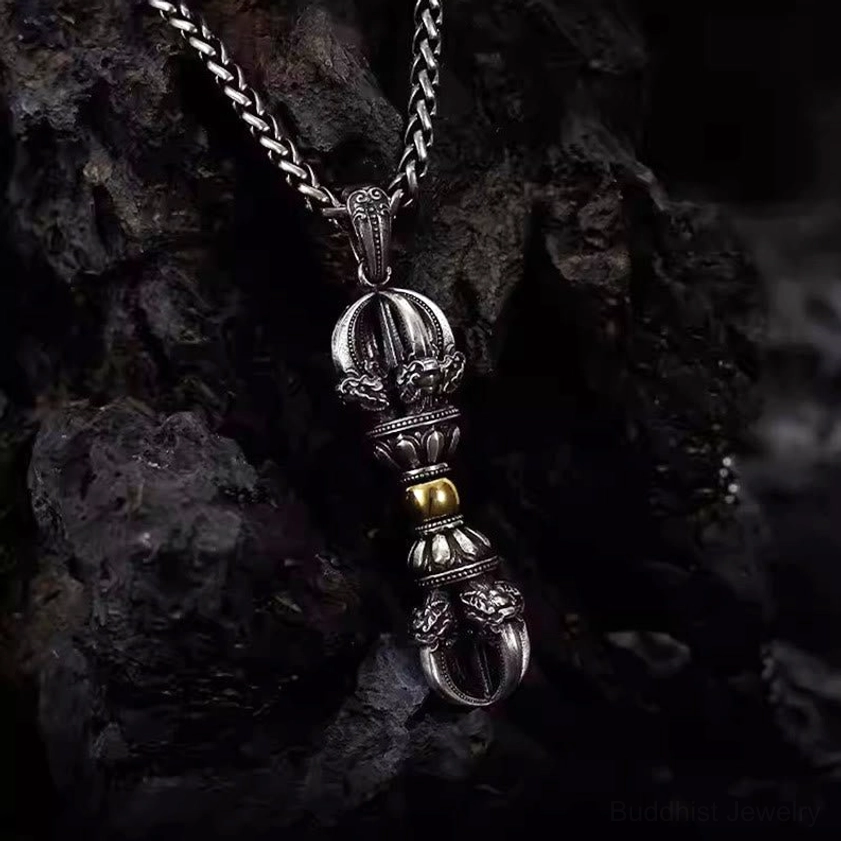 Dorje vajra copper necklace side view displaying curved vajra terminals and silver-gold two-tone craftsmanship