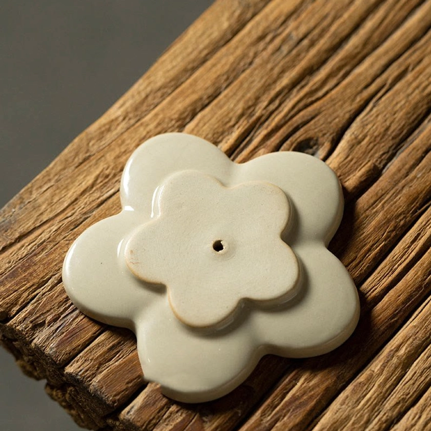 Stacked double plum blossom ceramic incense burner showing layered flower design