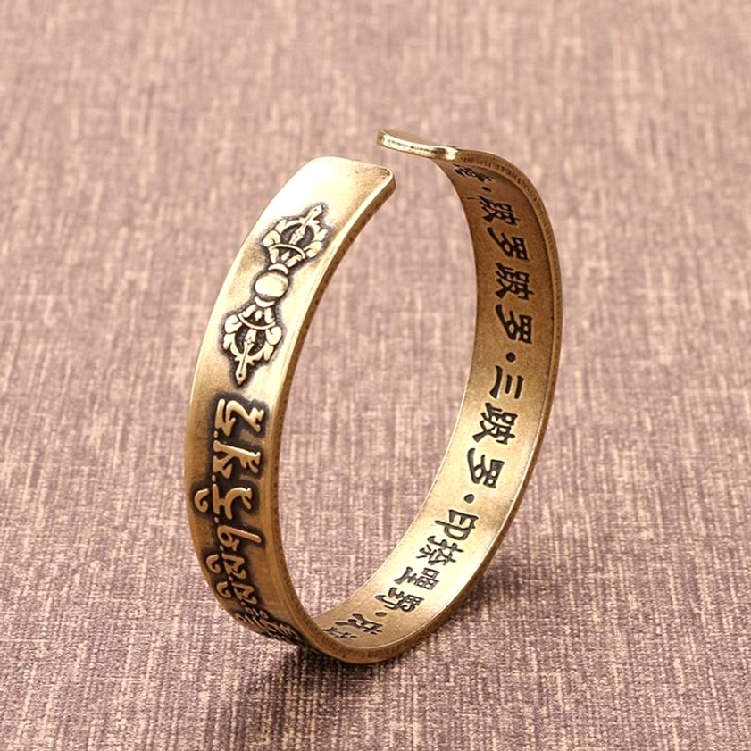 Side view of double-sided engraved open cuff bracelet with Vajra and Sanskrit mantra details