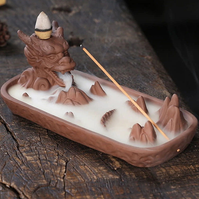 Brown dragon ceramic incense burner showing warm earth tone, handcrafted details, and mountain landscape tray