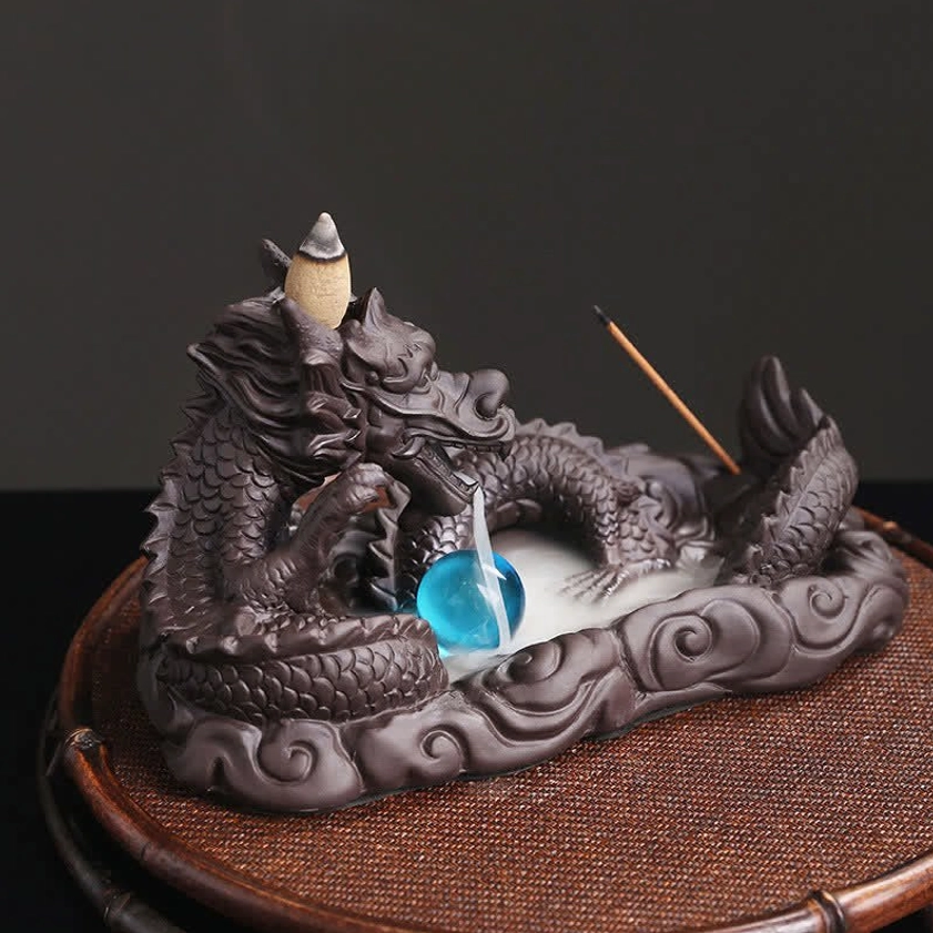 Purple clay dragon incense holder three-quarter front view displaying dragon head details, blue bead, incense cone and wooden stick included