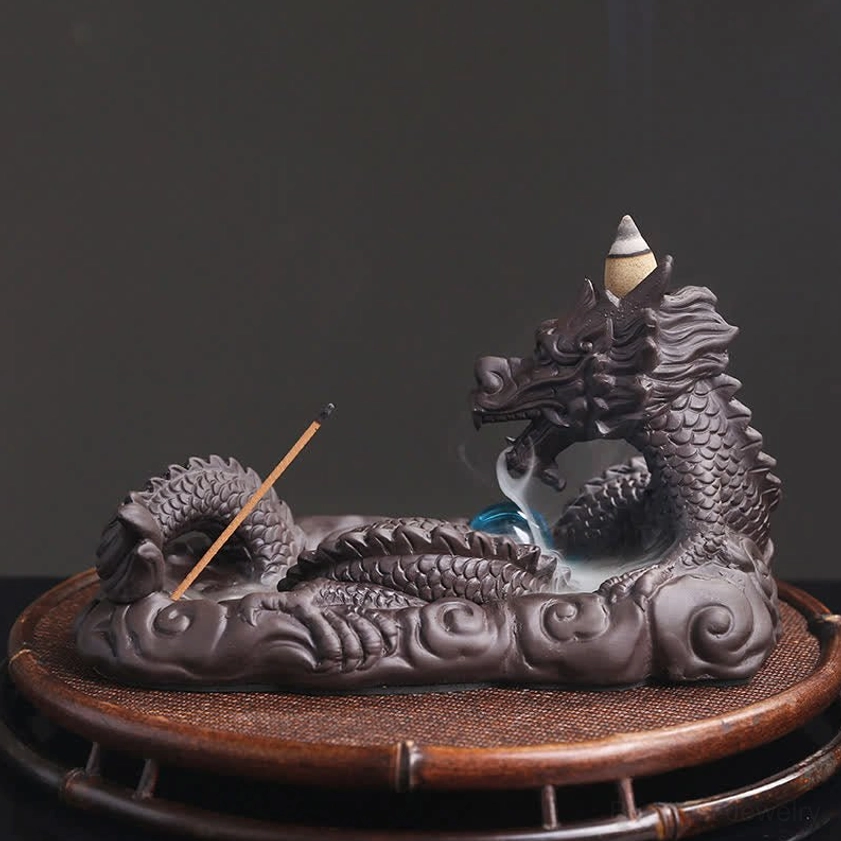 Buddhist dragon meditation incense holder left rear view featuring blue bead accent and incense accessories on natural coaster