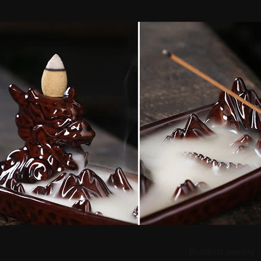 Dragon backflow incense burner detail shot showing mountain landscape tray pattern and handcrafted ceramic artistry