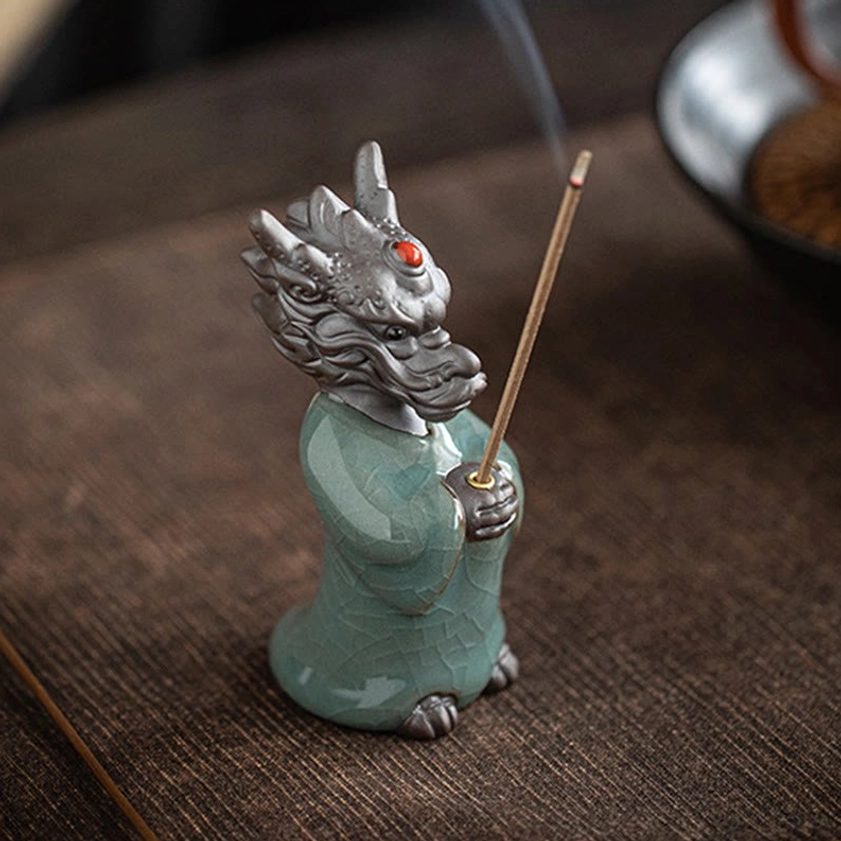 Dragon king incense holder complete set showing celadon ceramic figurine with ruby jewel on decorative lotus base
