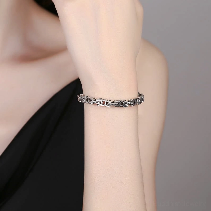 Dragon Om Mani Padme Hum copper bracelet worn on wrist showing fit and lifestyle styling