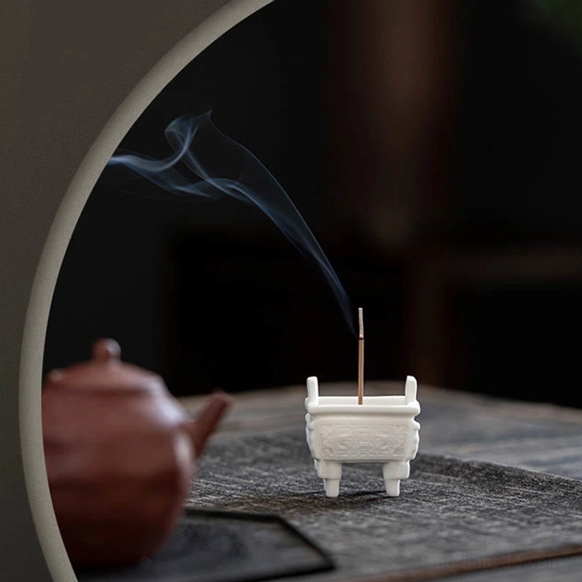 Dragon-patterned ceramic incense burner showcasing Buddhist symbolism and auspicious design elements for home altar