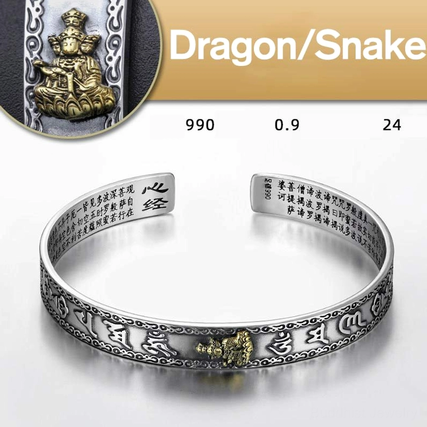 Dragon and Snake zodiac natal buddha silver cuff with Sanskrit text and gold-tone guardian buddha figure