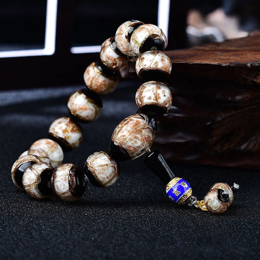 Multiple color variations of dragon vein agate bracelets blue white green brown dark red