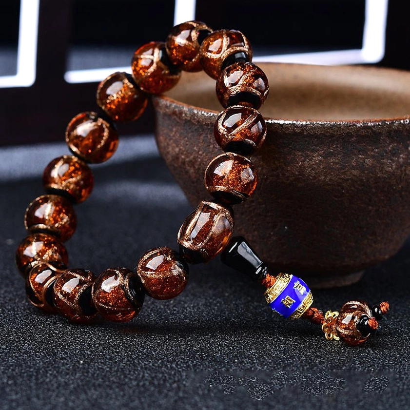 Reddish-brown dragon vein agate bracelet with blue enamel Buddhist-style pendant