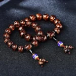 Dragon vein agate beaded bracelets in multiple colors with enamel pendants and golden flecks