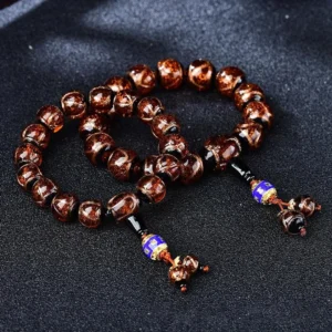 Dragon vein agate beaded bracelets in multiple colors with enamel pendants and golden flecks