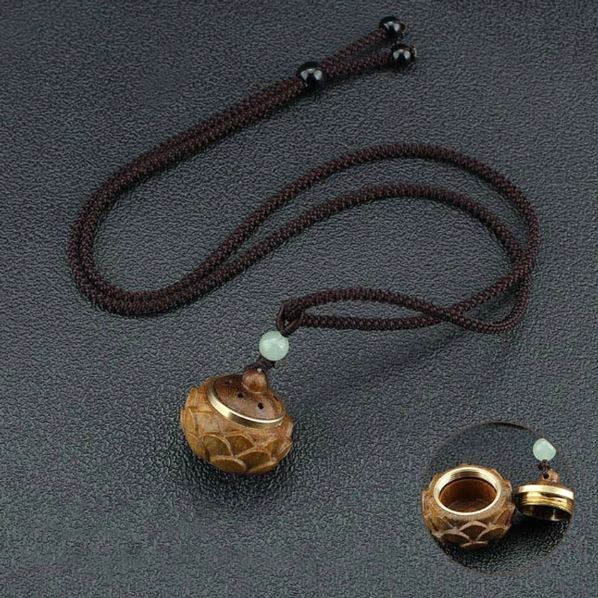 Drum-shaped rosewood Buddhist pendant necklace with carved Sanskrit mantra and decorative bead accents