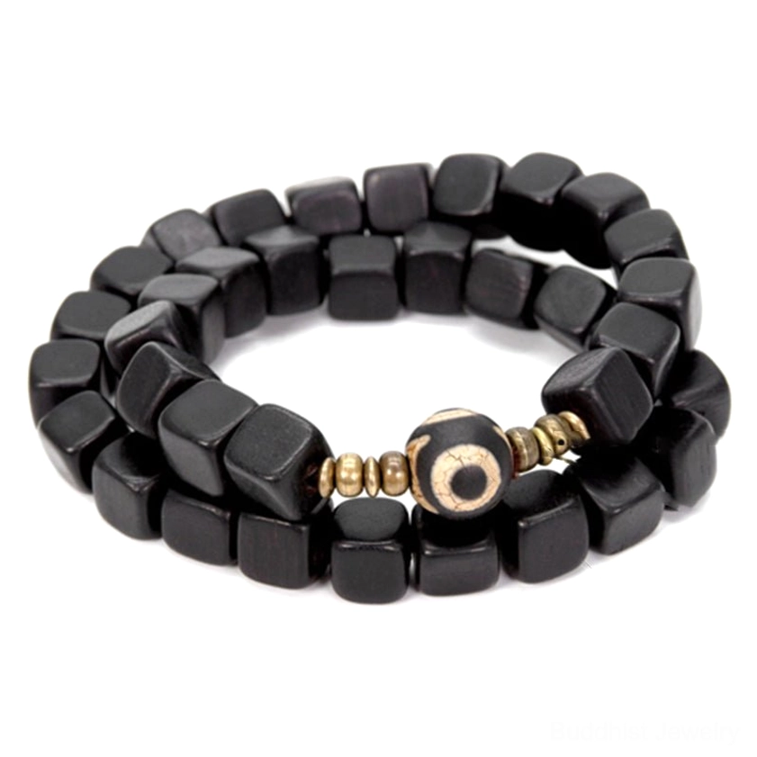 Hand-painted dzi bead bracelet with square ebony wood beads and bronze accents on white background