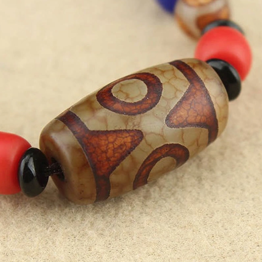 Dzi bead Buddhist necklace gift presentation showing meaningful spiritual jewelry for meditation and mindfulness practice