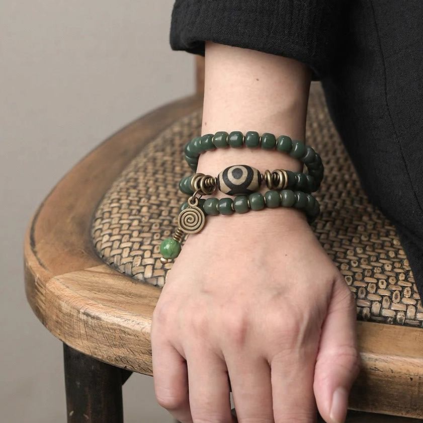 Triple wrap dzi bead bracelet for enlightenment and spiritual growth, artisan handcrafted with authentic materials