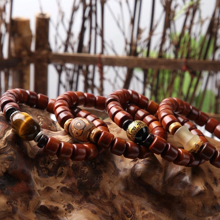 Three-eyed Dzi bone bead bracelet with small leaf red sandalwood for spiritual balance
