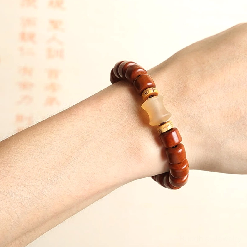 Three-eyed Dzi bone bead bracelet with tiger eye stone for courage and vitality