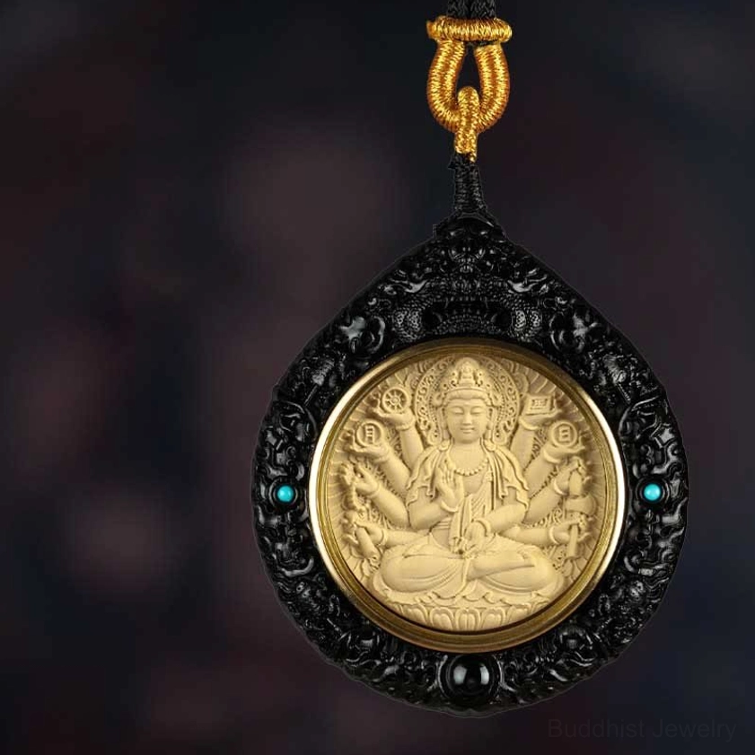 Ebony wood Avalokiteshvara Guan Yin Buddha necklace pendant with gold rope and turquoise detail front view