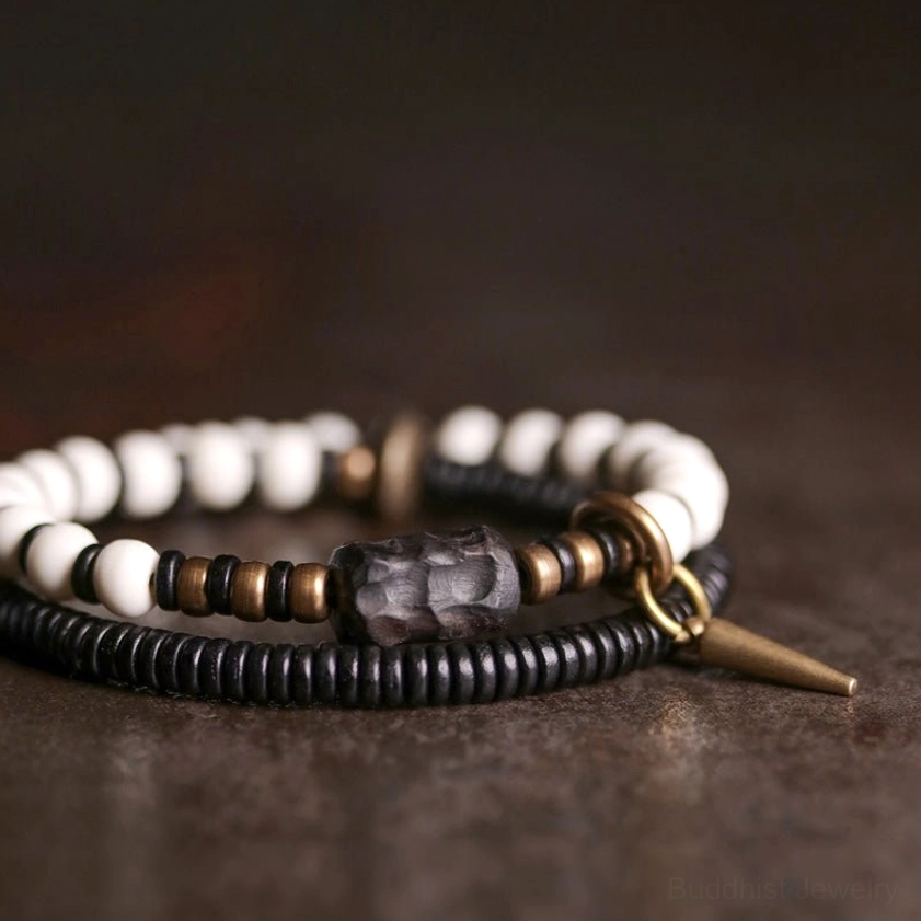 Ebony wood bone bead bracelet pair flat lay showing all bead and copper hardware details