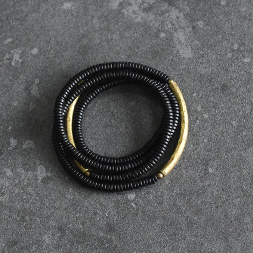 Double-layered ebony bead bracelet with curved brass accent Buddhist spiritual accessory