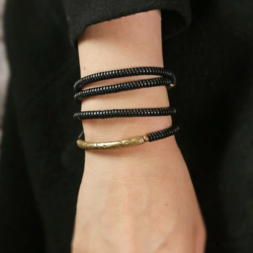 Black ebony disc beads with curved brass accent multilayered Buddhist protection bracelet