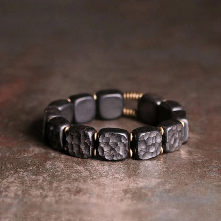 Ebony wood copper balance bracelet for meditation and spiritual protection showing bead craftsmanship