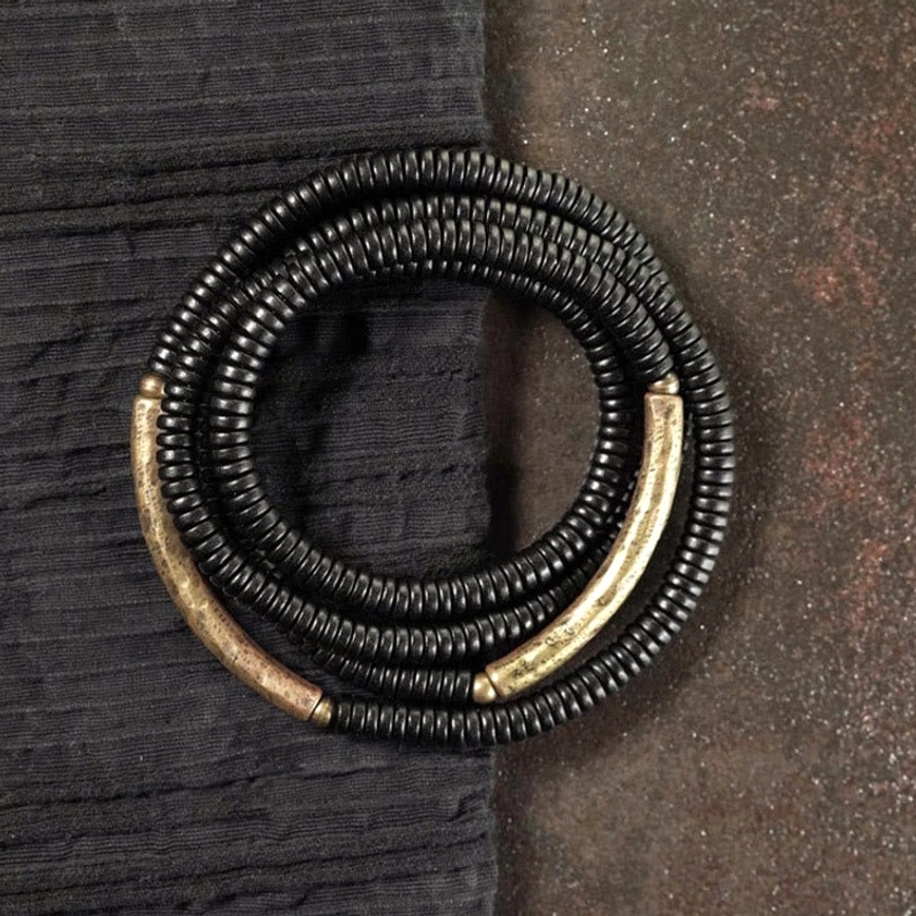 Black disc ebony beads with single long curved brass strip Buddhist protection bracelet