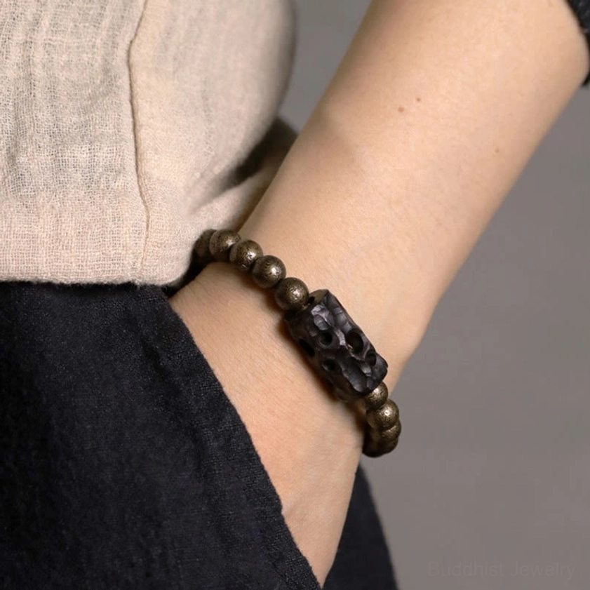 Handcrafted ebony wood copper bracelet worn on wrist with retro linen outfit, showing comfortable fit and minimalist design