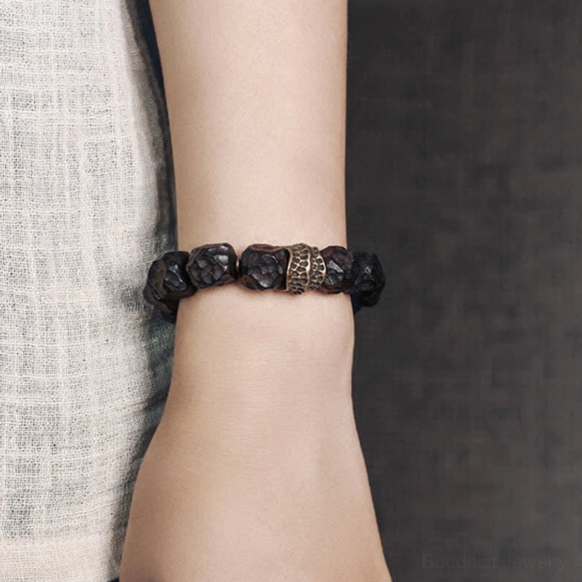 Ebony and copper balance bracelet displayed on wrist showing slim fit design and vintage aesthetic