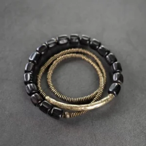 Ebony wood and antiqued copper three-strand Buddhist healing bracelet set - flat lay top view